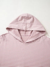 A soft pink and white striped casual loose fit hoodie with thumbhole side slits designed for machine wash cold care