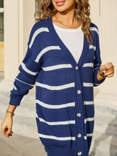 Blue and white striped knit cardigan with buttons, slightly stretchy
