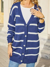 Blue and white striped knit cardigan with button closure, slightly stretchy