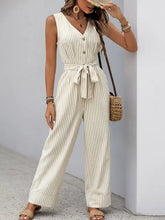Striped button-front wide leg jumpsuit in cream and beige stripes