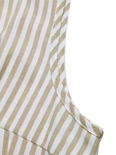 Striped button-front wide leg jumpsuit in white and beige vertical stripes