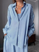 Striped blue and white long-sleeved button-up shirt from lounge set