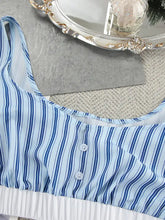 Light blue and navy striped sleeveless cami top with ruffled hem from lounge set