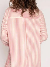 Ensemble détente femme avec haut à manches longues rayé à col et short