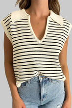 A cream and black striped collared neck tank knit sleeveless top with a collared neck for casual wear