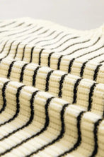 Cream-colored ribbed knit collared neck tank with bold black horizontal stripes striped collared design