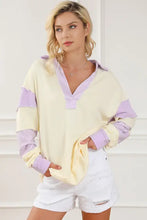 Women’s cream and purple striped contrast johnny collar long-sleeve top with distressed white denim shorts
