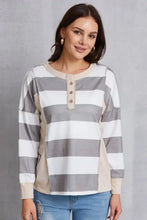 Women’s striped exposed seam buttoned long-sleeve henley t-shirt