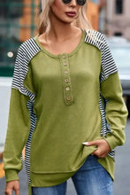 Striped exposed seam half button sweatshirt in olive green