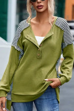 Striped exposed seam half button sweatshirt in olive green