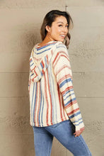 Women’s striped hooded sweater with kangaroo pocket