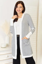 Striped longline cardigan with pockets, long sleeves, white and black stripes, open front