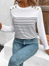Striped long sleeve shirt with decorative button shoulder detail