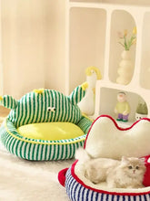Striped monster design pet nest with green yellow stripes and plush interior