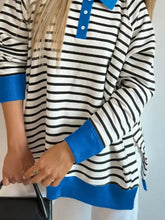 Striped polo collar long sleeve sweatshirt with black and white stripes, blue collar cuffs and hem, slightly stretchy fabric, machine wash cold