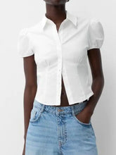 White fitted shirt with puffed sleeves and button-up front featuring a striped puff sleeve fitted design