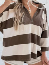 Cozy striped quarter zip long sleeve sweatshirt in earthy brown and cream with half-zip front and machine wash care instructions