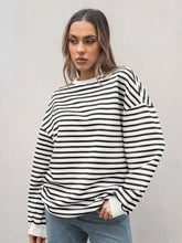 Black and white striped round neck oversized casual sweatshirt with slightly stretchy fabric, machine wash cold and tumble dry low