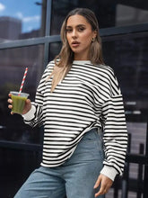 Black and white horizontally striped oversized casual sweatshirt with ribbed cuffs slightly stretchy machine wash cold tumble dry low