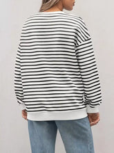 Black and white horizontally striped oversized casual sweatshirt with relaxed fit slightly stretchy machine wash cold tumble dry low
