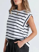 Black and white striped round neck tank with sleeveless design and relaxed fit for casual wear