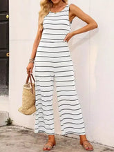 Striped round neck wide leg jumpsuit in white and black stripes