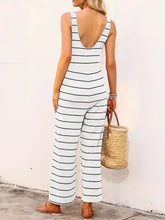 Striped round neck wide leg jumpsuit in white and black, machine wash cold