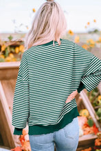 Green and white striped long-sleeved slightly stretchy round neck Christmas sweatshirt with ruffled hemline, machine wash cold