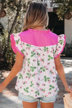 A vibrant pink and white strawberry color block patchwork v neck flutter sleeve blouse with ruffled sleeves