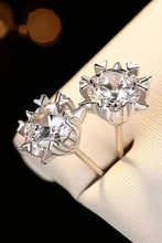 4 carat moissanite stud earrings with silver flower design