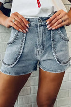 Studded acid wash denim shorts with light wash pockets