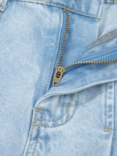 Light blue denim wide-leg jeans with studded slit leg frayed pockets and brass sab engraved zipper pull tab