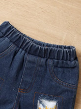 Sunflower ruffled short sleeve top with blue denim shorts for baby girls