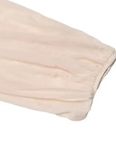 Cream-colored sweetheart neck balloon sleeve bodysuit with softly wrinkled fabric and gathered elastic cuff