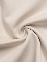 Cream-colored soft knit fabric with subtle ribbed pattern on sweetheart neck balloon sleeve bodysuit