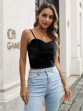 Black velvet sweetheart neck cropped cami with thin straps and a flattering sweetheart neckline for stylish wear