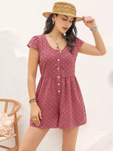 Dusty rose swiss dot cap sleeve romper with floral pattern and button front