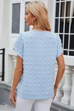 Light blue Swiss dot round neck short sleeve T-shirt with pom-pom details