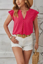 Women’s pink swiss dot ruffled cap sleeve top