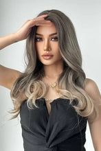 Synthetic long ash blonde wig with dark roots, loose waves, center part
