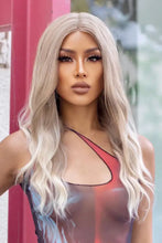 Synthetic long wave ombre wig with medium blonde highlights, cap included