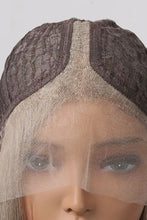 Synthetic long wave ombre wig with medium blonde highlights, cap included