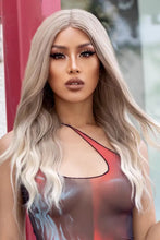 Synthetic long wave ombre wig with medium blonde highlights, cap included