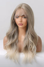 Synthetic long wave ombre wig with medium blonde highlights, cap included