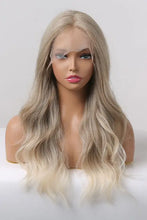 Synthetic long wave ombre wig with medium blonde highlights, cap included