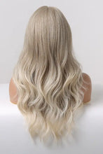 Synthetic long wave ombre wig with medium blonde highlights, cap included