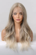 Synthetic long wave ombre wig with medium blonde highlights, cap included