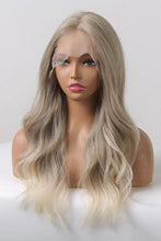 Synthetic long wave ombre wig with medium blonde highlights, cap included