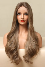 Synthetic long wave golden brown wig with cap included on mannequin
