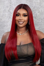 Synthetic straight vibrant red wig with dark roots, heat safe, cap included